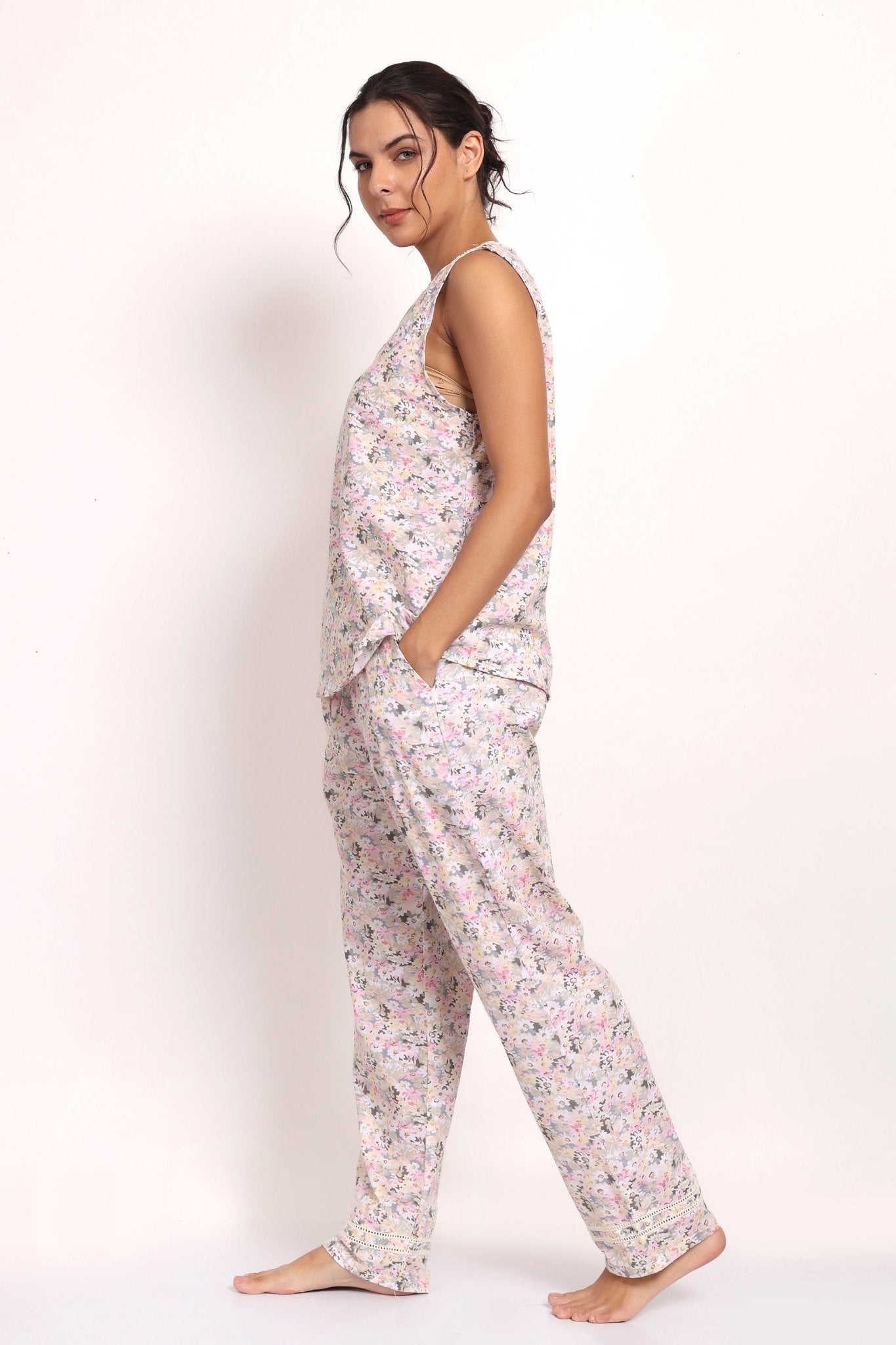 Side profile of model in relaxed-fit Gatsby floral PJ set showing breezy sleeveless top.