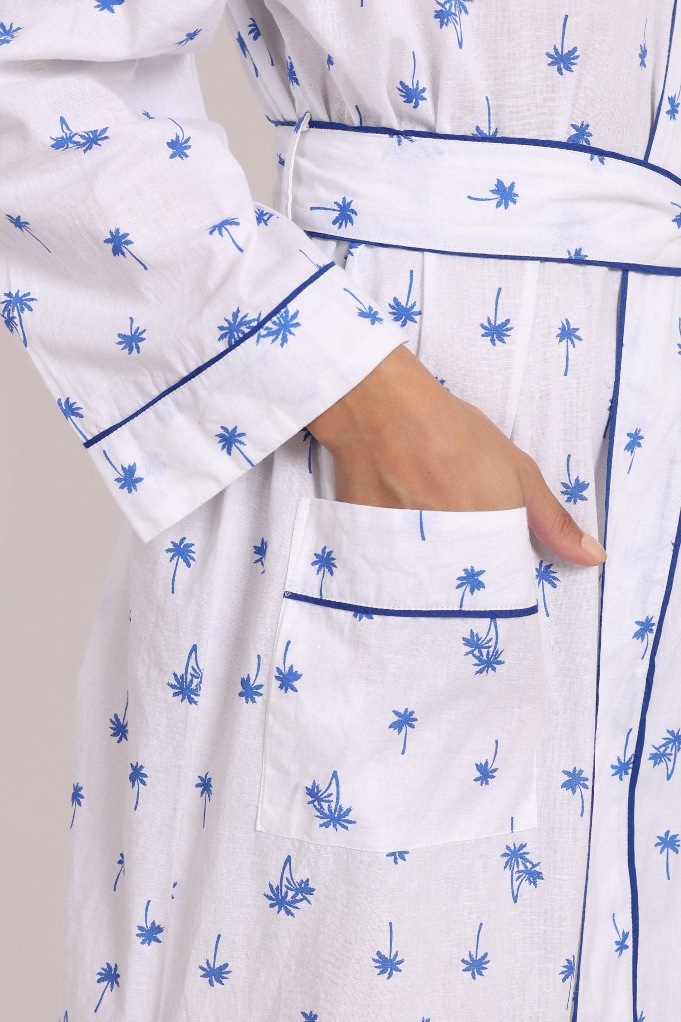 Close-up of side pocket detail and soft cotton fabric texture.