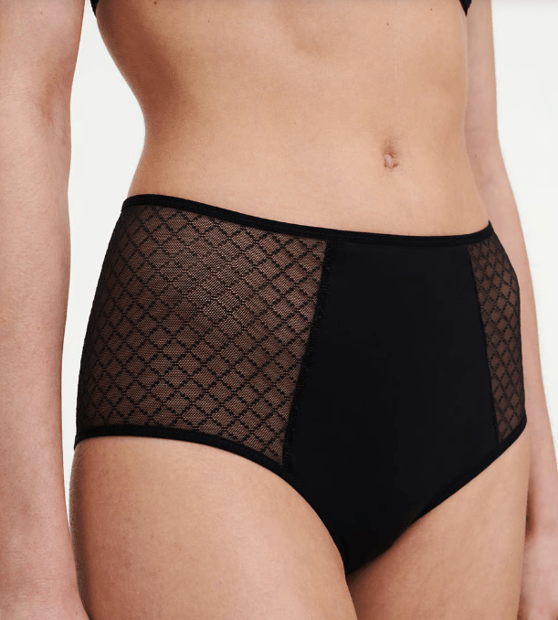 Angled front view of model wearing Chantelle Norah Chic High Waist Full Brief Black soft opaque knit with stylish tulle.
