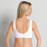 Back and side view of Anita Seamless Maternity Sleep Bra White on model, featuring broad straps and smooth coverage, provided by The Foundation.