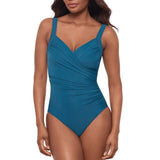 Woman in aegean blue cross over swimsuit