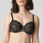 Side profile of PrimaDonna Sophora Full Cup Bra Black on model, showing flattering lift and soft mesh details, available at The Foundation.