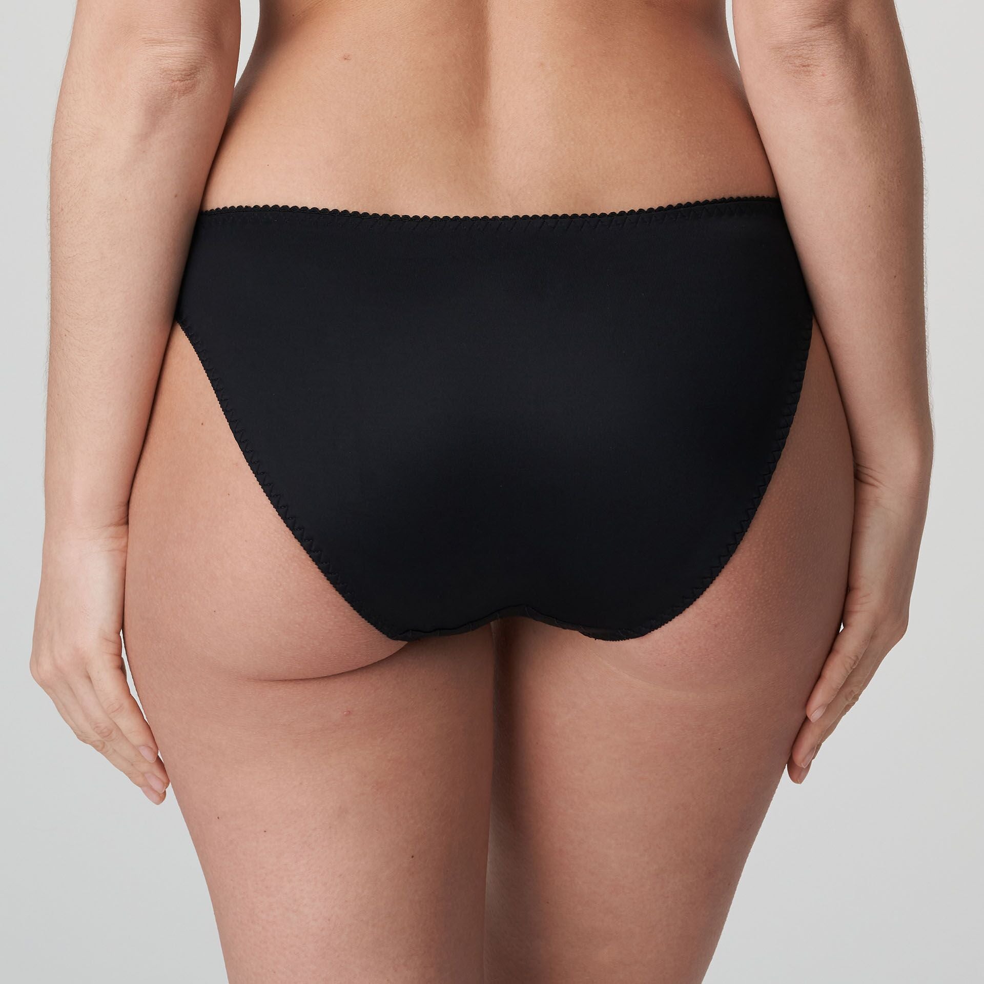 Back view of PrimaDonna Deauville Rio Brief in black, offering smooth, seamless comfort with a supportive fit.