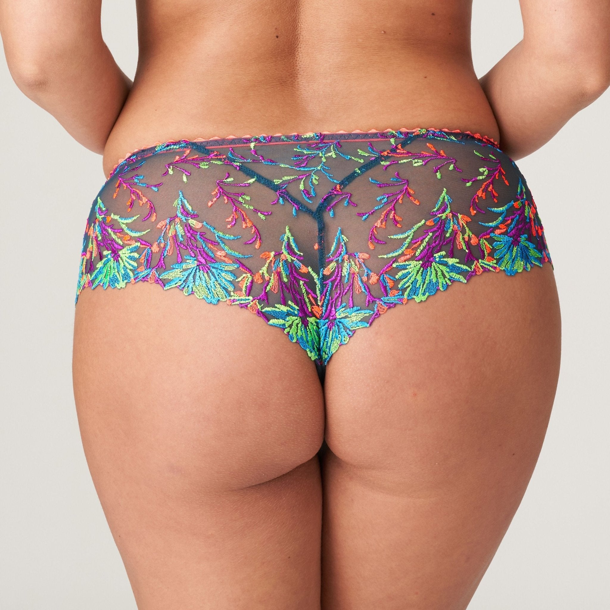 Back view of Las Salinas Empire Green Thong – sheer mesh and cheeky coverage with bright embroidered accents.
