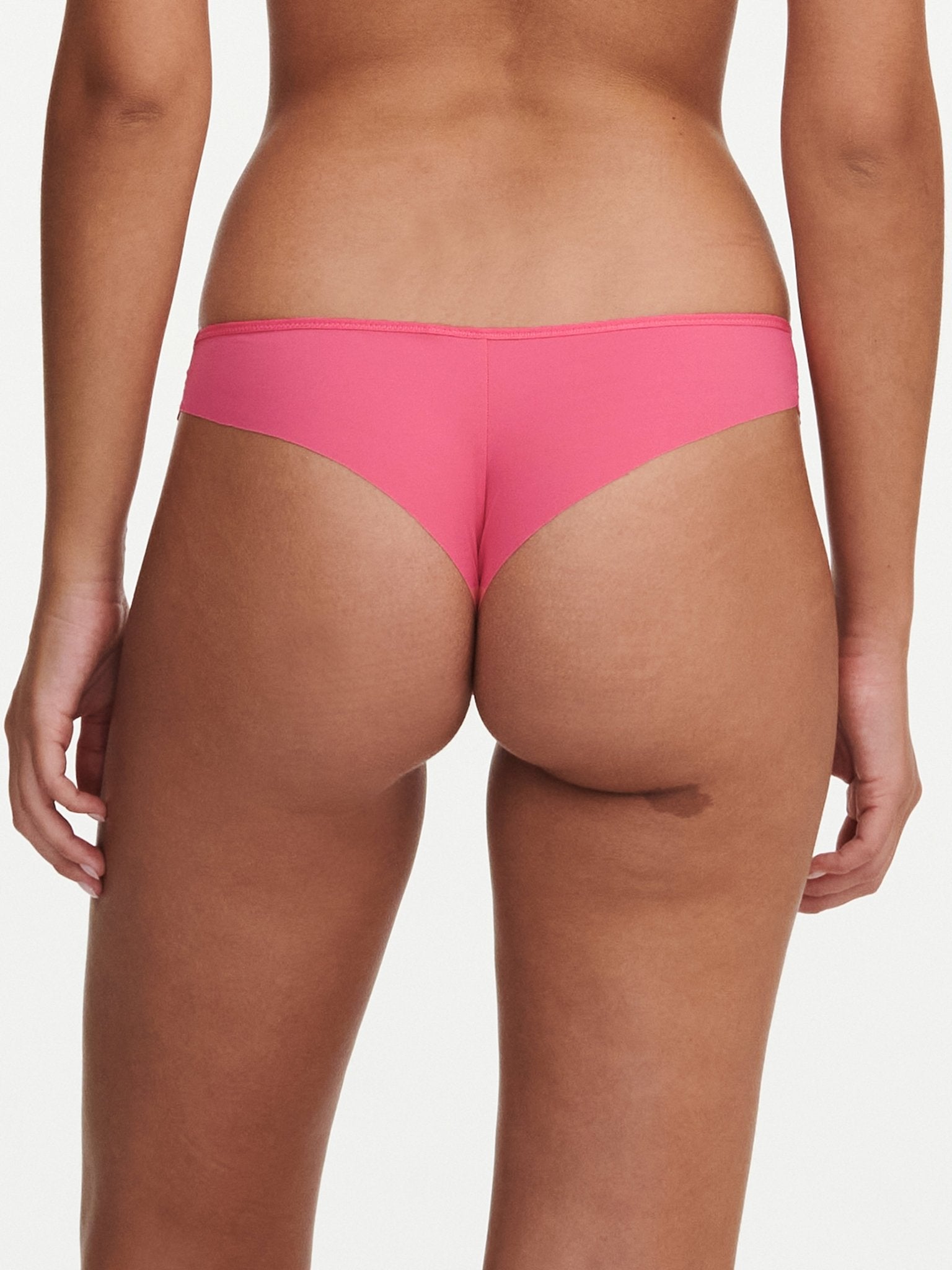 Back view of the Pila Tanga Brief in Love Pink/Peach with scalloped lace detailing and cheeky silhouette – The Foundation.