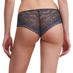 Model showcasing the back of the Pila Shorty Brief in Sailing Blue, featuring semi-sheer lace with a floral design for a chic, feminine touch.