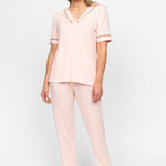 Front view of the Nora Rose Sally Lace-Detail Jersey Pyjama Set, showing V-front button-up top with lace inserts and matching bottoms with shell lace hem.