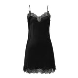 Flat lay of the Scarlett Silk Chemise in black, highlighting the detailed eyelash lace trim and smooth silk texture for luxury loungewear appeal.