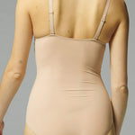 Back view of the Caresse 3D Control Bodysuit Peau Rose by Simone Perele, sold by The Foundation – smooth finish ideal under dresses and fitted outfits.