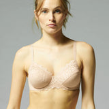 Model wearing Simone Pérèle Caresse Full Cup Bra in Peau Rose from The Foundation, featuring lace overlay, cotton lining, and supportive shaping. front view