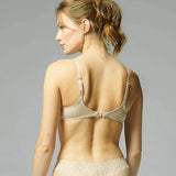 Model wearing Simone Pérèle Caresse Full Cup Bra in Peau Rose from The Foundation, featuring lace overlay, cotton lining, and supportive shaping. back view