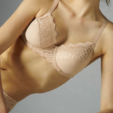 Model wearing Simone Pérèle Caresse Full Cup Bra in Peau Rose from The Foundation, featuring lace overlay, cotton lining, and supportive shaping. close up