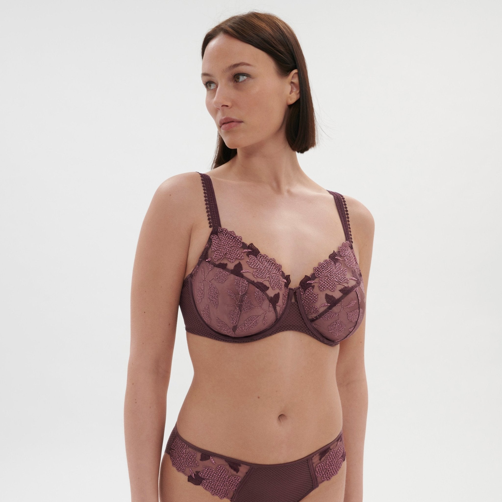 Model wears the Dahlia Full Cup Control Bra Byzantine, showing dusky pink embroidery and flattering support from The Foundation.