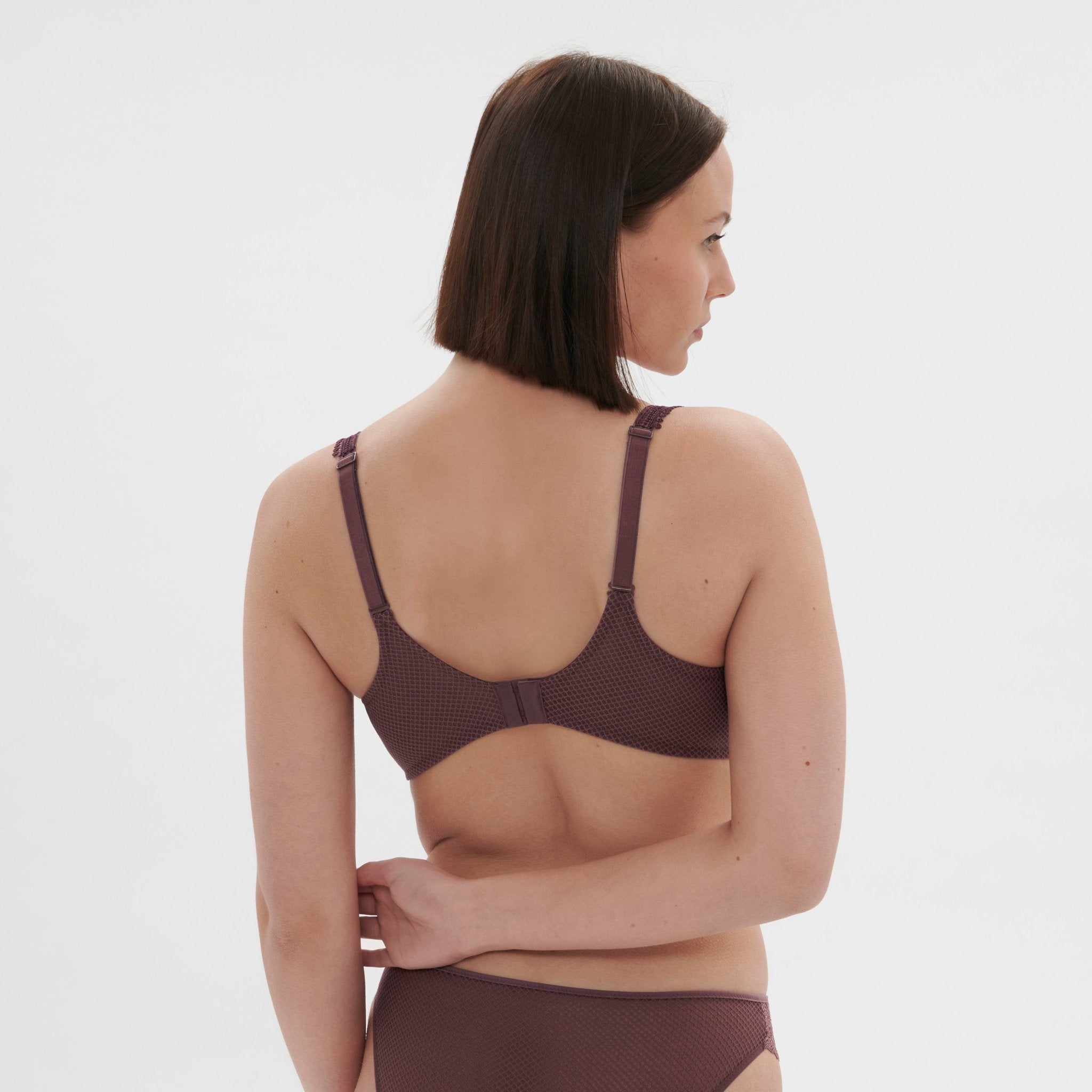 Side profile of model in Dahlia Full Cup Control Bra Byzantine, showing supportive fit and comfort from The Foundation.