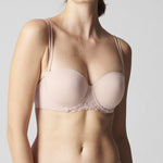 Model wearing Simone Perele Delice Strapless Bra in blush – elegant and modern lingerie option from The Foundation
