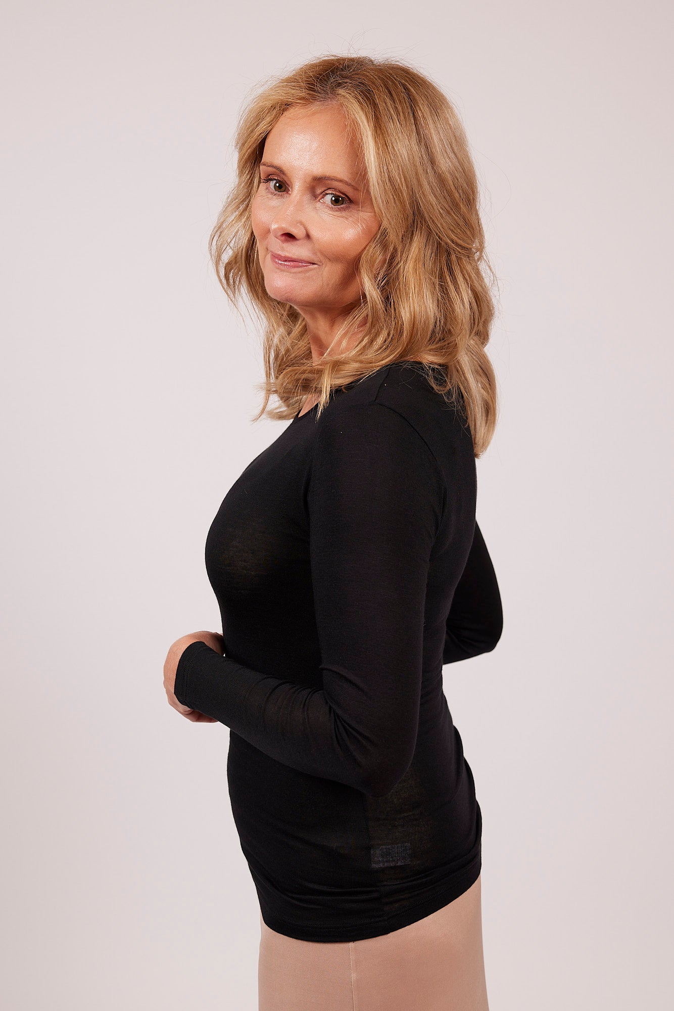 TBL Modal Cashmere Long Sleeve Top in Black with scoop neckline and lightweight Italian-made thermal fabric – available at The Foundation