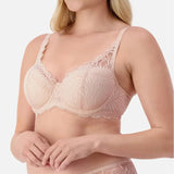 Side view of model in Triumph Essential Lace Balconette Bra WHP Nude Pink showing comfortable fit and feminine lace detail.
