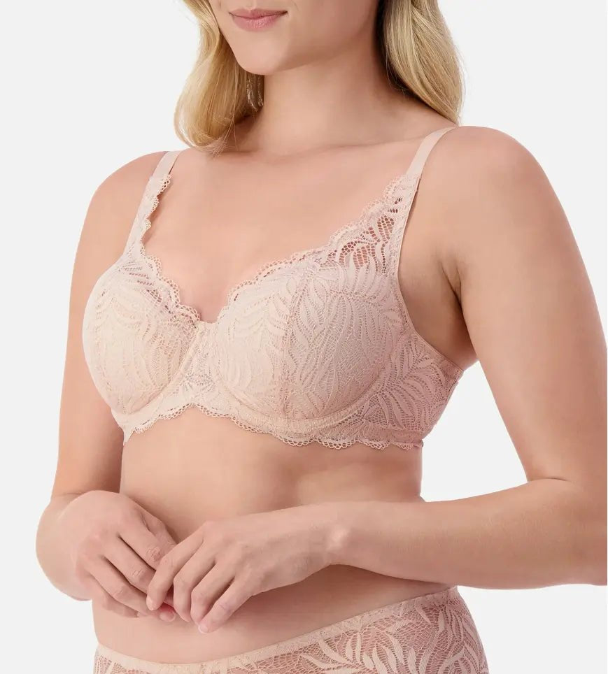 Side view of model in Triumph Essential Lace Balconette Bra WHP Nude Pink showing comfortable fit and feminine lace detail.