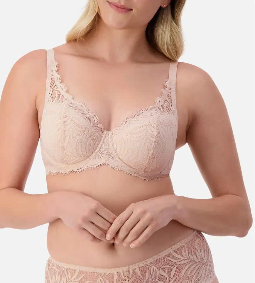 Front view of Triumph Essential Lace Balconette Bra WHP Nude Pink on model showing supportive lace cups and elegant straps.