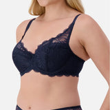 Side angle of Triumph Essential Lace Balconette Bra WHP Navy Blue on model showing lightly padded cups and elegant lace detail.