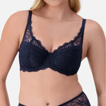 Front view of Triumph Essential Lace Balconette Bra WHP Navy Blue on model featuring wide lace straps and supportive underwire fit.