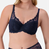 Front view of Triumph Essential Lace Balconette Bra WHP Navy Blue on model featuring wide lace straps and supportive underwire fit.