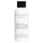 100ml bottle of Bon Savvy Silk Savvy Laundry Liquid featuring minimalist label design, ideal for delicate fabrics and travel use.