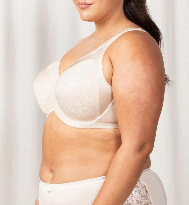 Side view of Triumph Endless Comfort Bra in soft Fresh Powder shade with multi-piece cup and underwire—shop now at The Foundation.