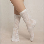 Luxurious silk socks made by bleuforet with baroque lace patterned in white