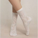 Luxurious silk socks made by bleuforet with baroque lace patterned in white