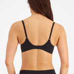 Back view of the Berlei Understate Wirefree Bra in Black from The Foundation—features smoothing side bands and soft, secure straps.