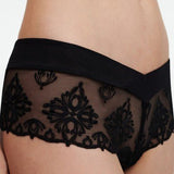 Side view of the Champs Elysées Lace Shorty by The Foundation, highlighting elegant tulle and elastic-trimmed edges.