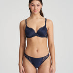 Full body shot of model in Jane Half Padded Balcony Bra Velvet Blue with matching briefs from The Foundation, perfect for a coordinated lingerie set