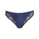Flat lay of Italian Brief Velvet Blue with intricate floral lace pattern and velvet trim.