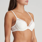 Side angle of model in Jane Push Up Bra Natural from The Foundation, showcasing adjustable straps and elegant lace details