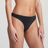Side angle of Tom Thong Brief Charcoal by Marie Jo, showcasing barely-there comfort.