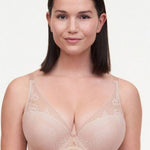 Model wearing Maddie Plunge T-Shirt Bra in Soft Pink with floral lace, showcasing a low plunge neckline.