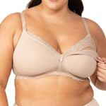 Model wearing Gorgeous Mama Maternity Bra in Nude with one cup unclipped to show drop-down nursing feature.
