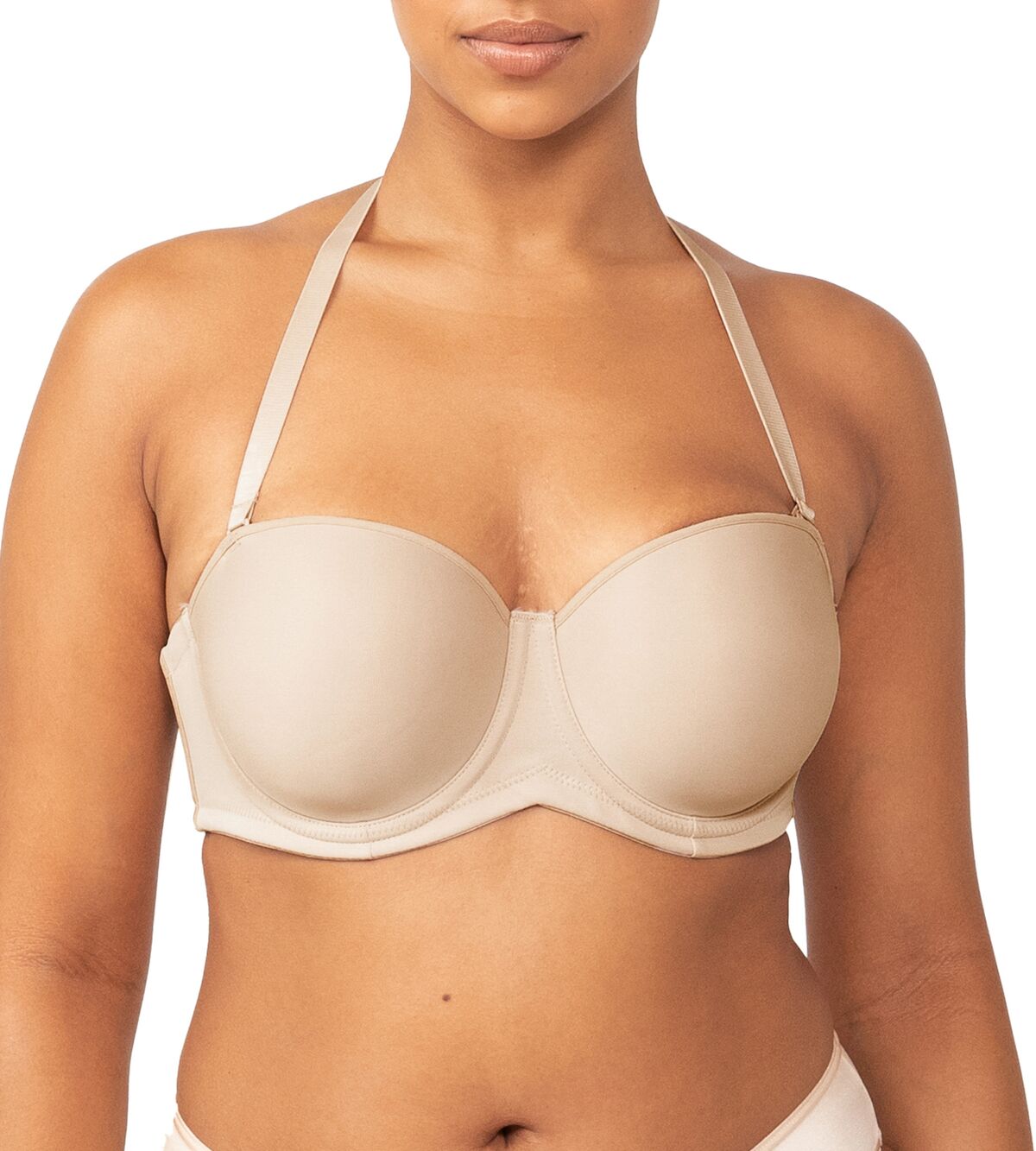 Triumph nude strapless bra worn with straps in classic position, highlighting smooth fit—available at The Foundation.