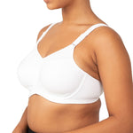 Side profile of a model wearing the Triaction Ultra W Sports Bra White, highlighting underwired support.