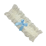 White lace bridal garter with light blue bow, available at The Foundation, elegant Italian-made accessory for a wedding day tradition.