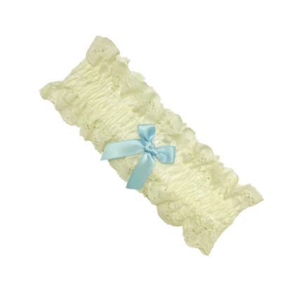 Ivory lace bridal garter with a light blue bow, available at The Foundation, an elegant “something blue” wedding accessory for your special day.