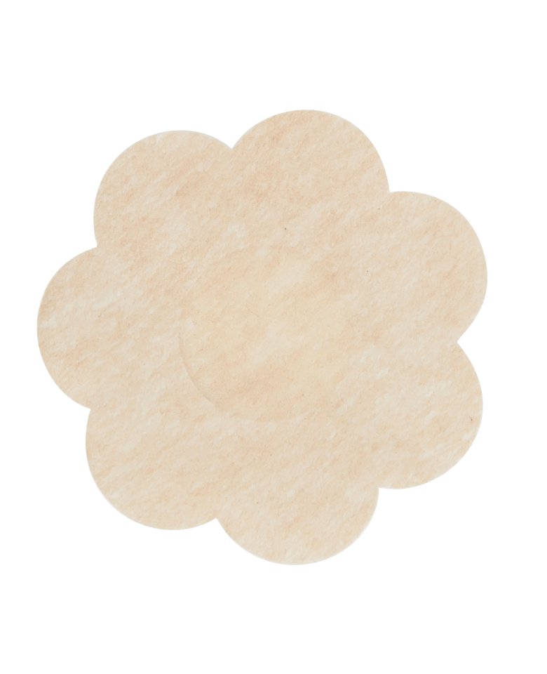 Single flower-shaped nude nipple cover for discreet use under clothing.