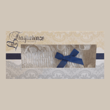 The Foundation’s ivory lace bridal garter by Trasparenze, featuring a delicate dark blue bow, boxed and ready for your wedding day.
