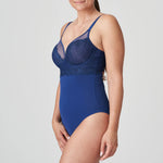 Angled view of Sophora Royal blue Bodysuit showing bust lift and smooth silhouette through the torso.