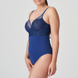 Angled view of Sophora Royal blue Bodysuit showing bust lift and smooth silhouette through the torso.