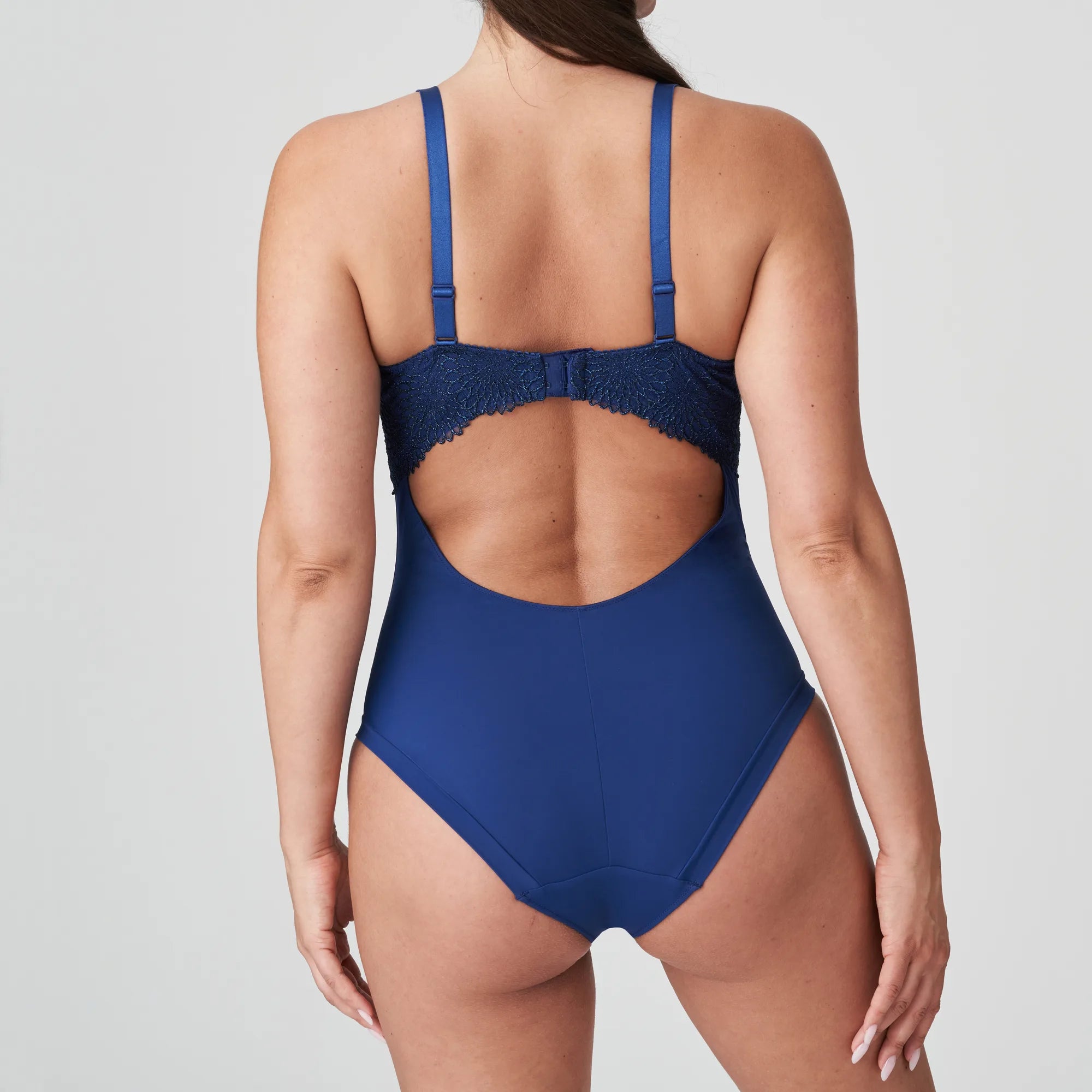 Back view of Royal blue Sophora Bodysuit with adjustable straps and clasp back detail.