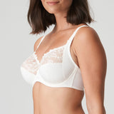 Model wearing PrimaDonna Deauville Full Cup Bra in Natural from The Foundation, featuring deep supportive cups and elegant embroidered detailing. side view