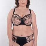 Model in Perla Midi Brief Black paired with Perla Soft High Apex Bra – front view – The Foundation