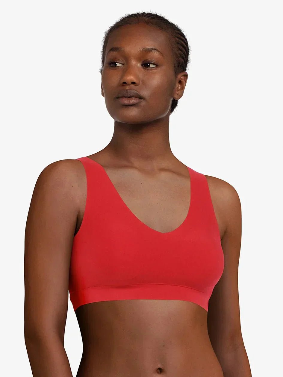 Model wearing Chantelle SoftStretch Padded Top in Poppy Red — seamless, wirefree bra with second-skin comfort